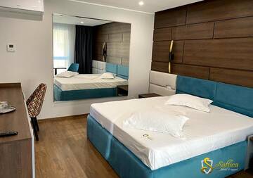Фото номера Улучшенный двухместный номер с 1 кроватью Мотели Hotel Saftica г. Săftica 20