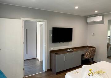Фото номера Улучшенный двухместный номер с 1 кроватью Мотели Hotel Saftica г. Săftica 15