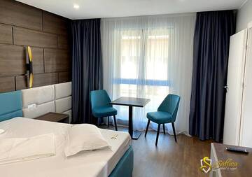 Фото номера Улучшенный двухместный номер с 1 кроватью Мотели Hotel Saftica г. Săftica 21