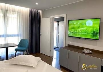Фото номера Улучшенный двухместный номер с 1 кроватью Мотели Hotel Saftica г. Săftica 26