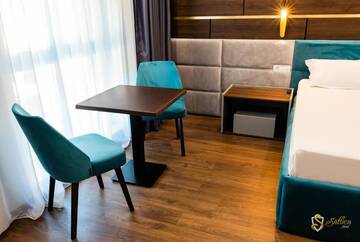 Фото номера Улучшенный двухместный номер с 1 кроватью Мотели Hotel Saftica г. Săftica 33