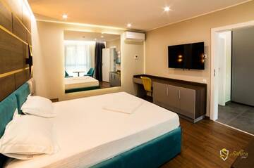 Фото номера Улучшенный двухместный номер с 1 кроватью Мотели Hotel Saftica г. Săftica 35