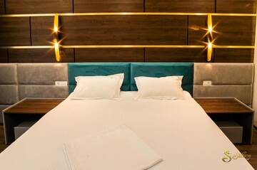 Фото номера Улучшенный двухместный номер с 1 кроватью Мотели Hotel Saftica г. Săftica 36